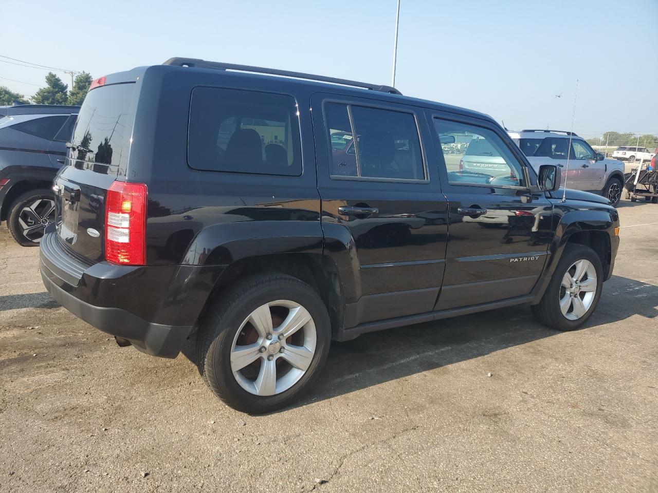 2013 Jeep Patriot Latitude black suv gas 1C4NJPFB9DD250422 photo #4