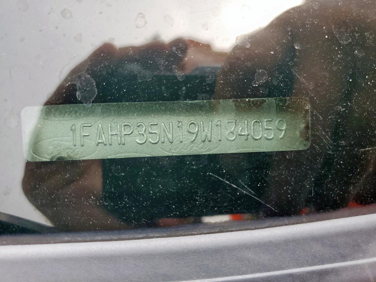 2009 Ford Focus Se VIN: 1FAHP35N19W184059 Lot: 69842205