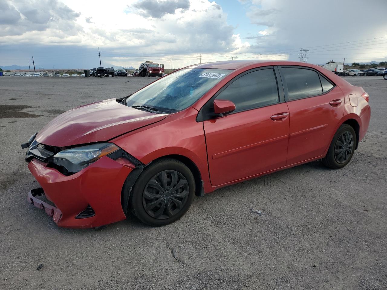 2017 Toyota Corolla L red null gas 5YFBURHE8HP631761 photo #1