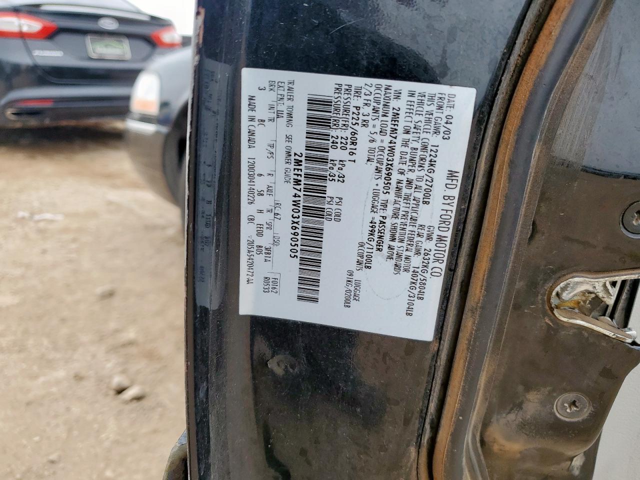 2003 Mercury Grand Marquis Gs VIN: 2MEFM74W03X690505 Lot: 70891345