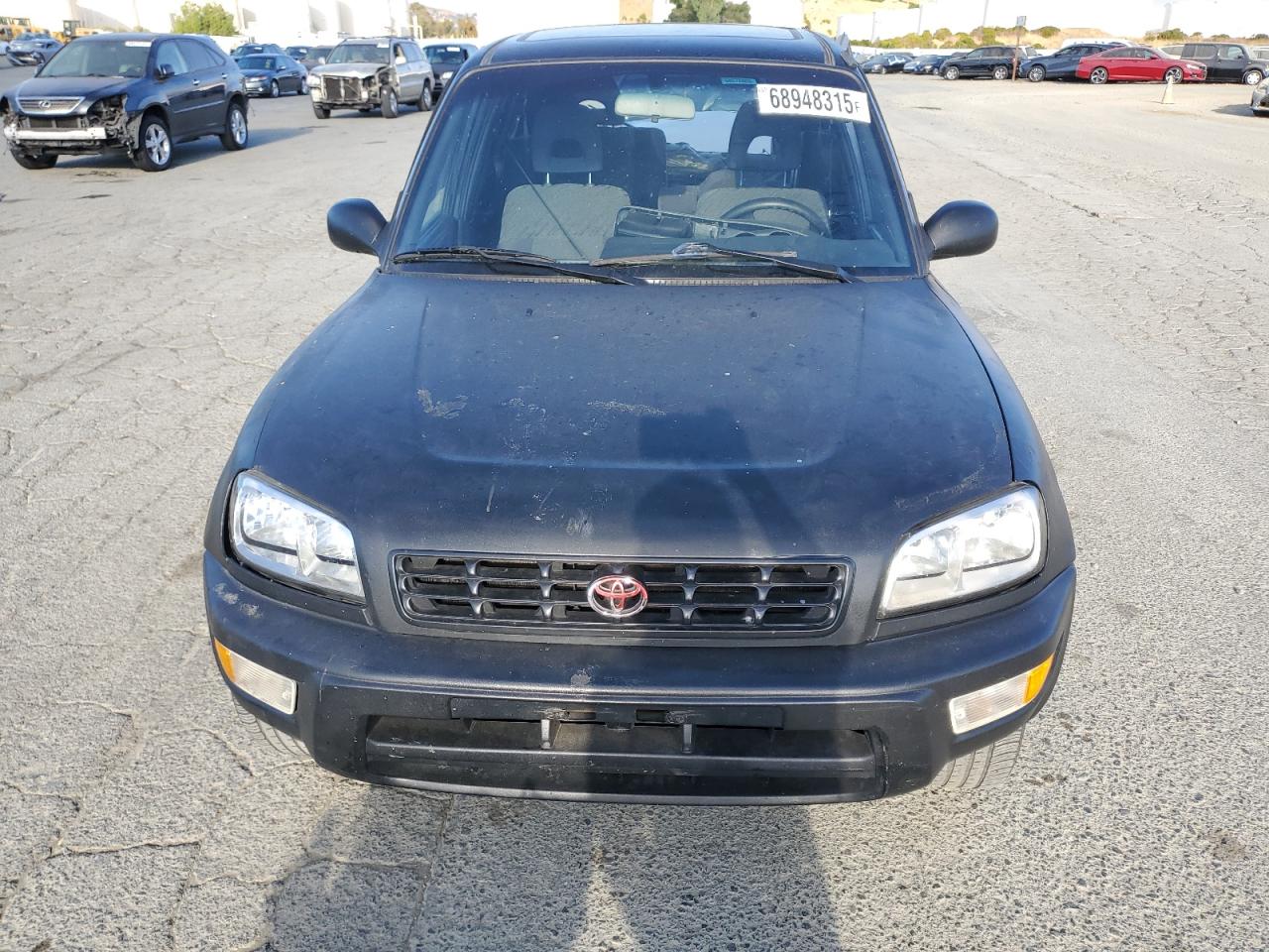 1999 Toyota Rav4 VIN: JT3GP10V9X7061574 Lot: 68948315