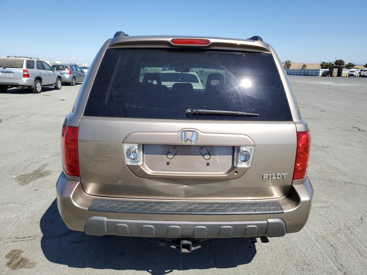 2004 Honda Pilot Exl VIN: 2HKYF18504H611209 Lot: 70056665