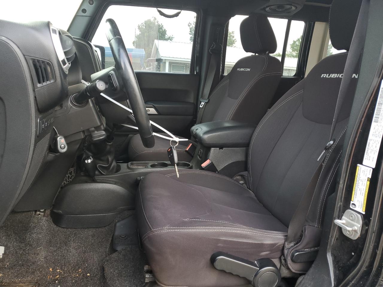 2014 Jeep Wrangler Unlimited Rubicon VIN: 1C4BJWFG4EL102999 Lot: 68542635