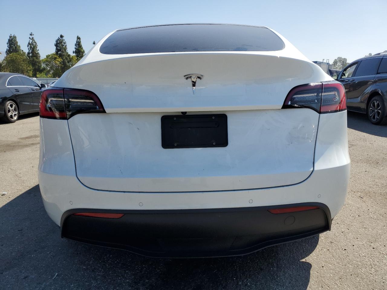 2021 Tesla Model Y VIN: 5YJYGDED5MF107750 Lot: 67389625