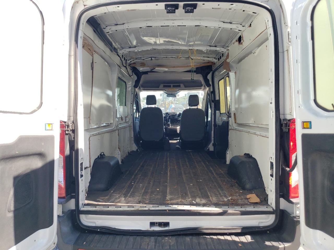 2015 Ford Transit T-150 VIN: 1FTNE2CM7FKA08773 Lot: 69261025