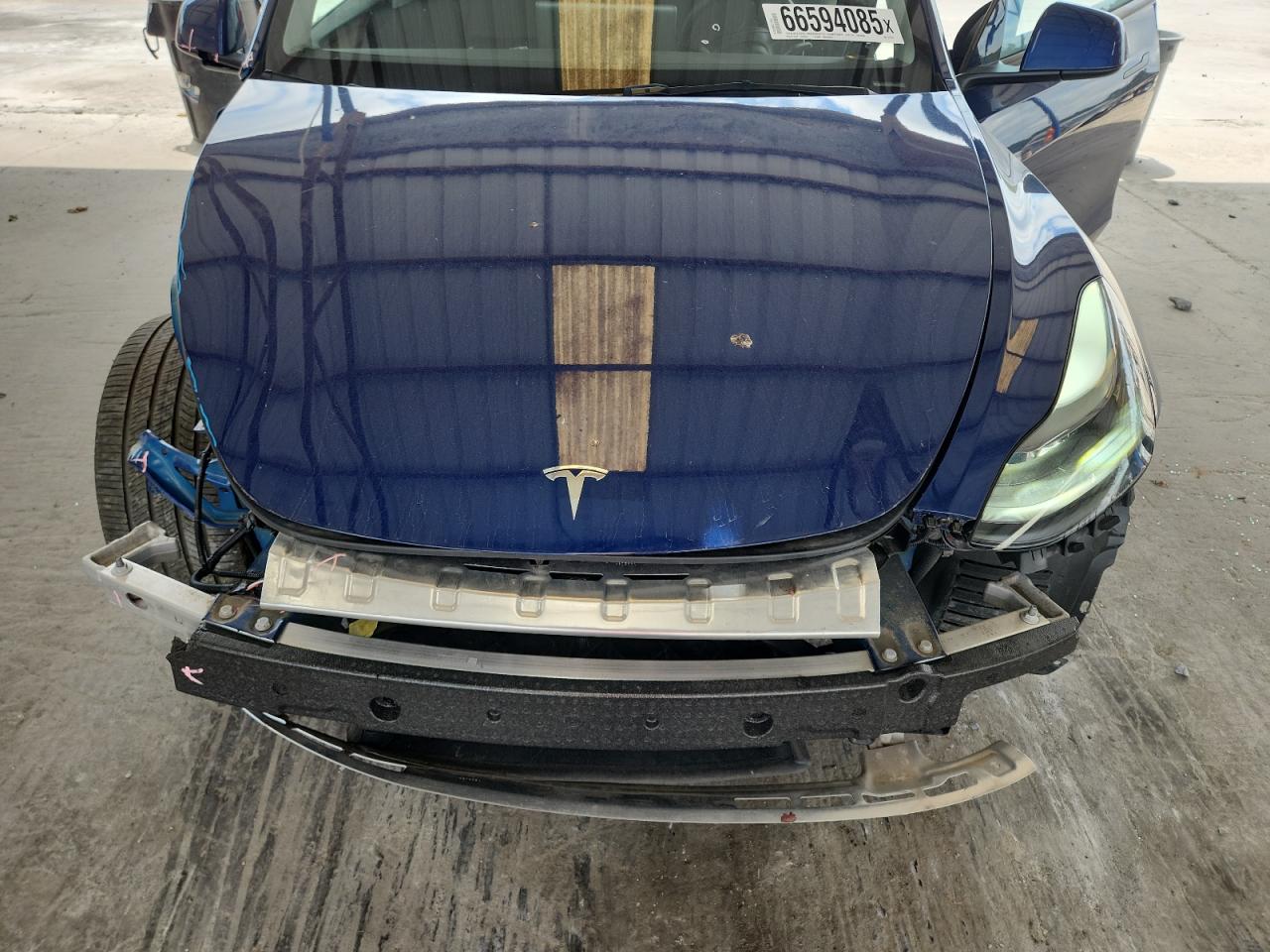 2024 Tesla Model Y VIN: 7SAYGDEE5RA217973 Lot: 66594085