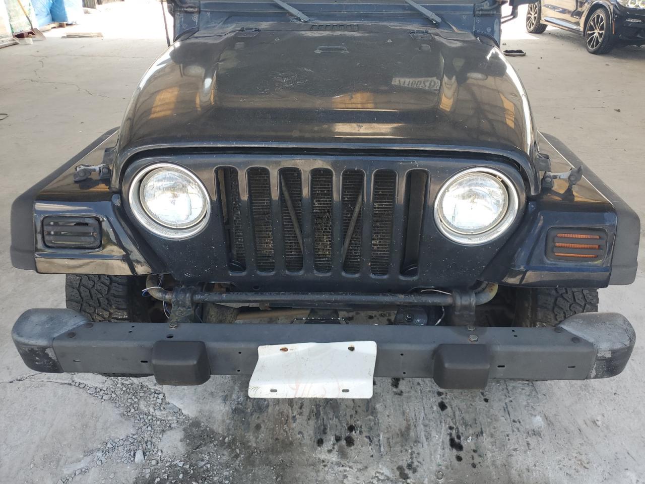 2000 Jeep Wrangler / Tj Se VIN: 1J4FA29P0YP738655 Lot: 71166285