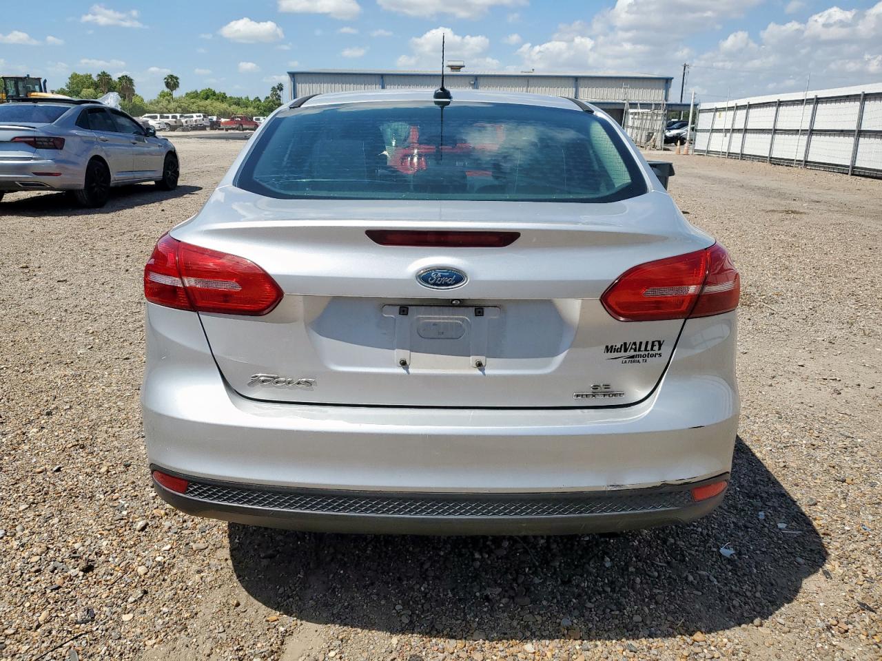 2015 Ford Focus Se VIN: 1FADP3F24FL356715 Lot: 70700595