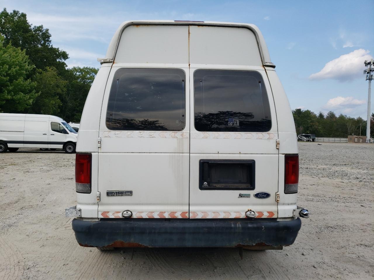 2009 Ford Econoline E150 Van VIN: 1FTNE14W29DA69225 Lot: 68301745