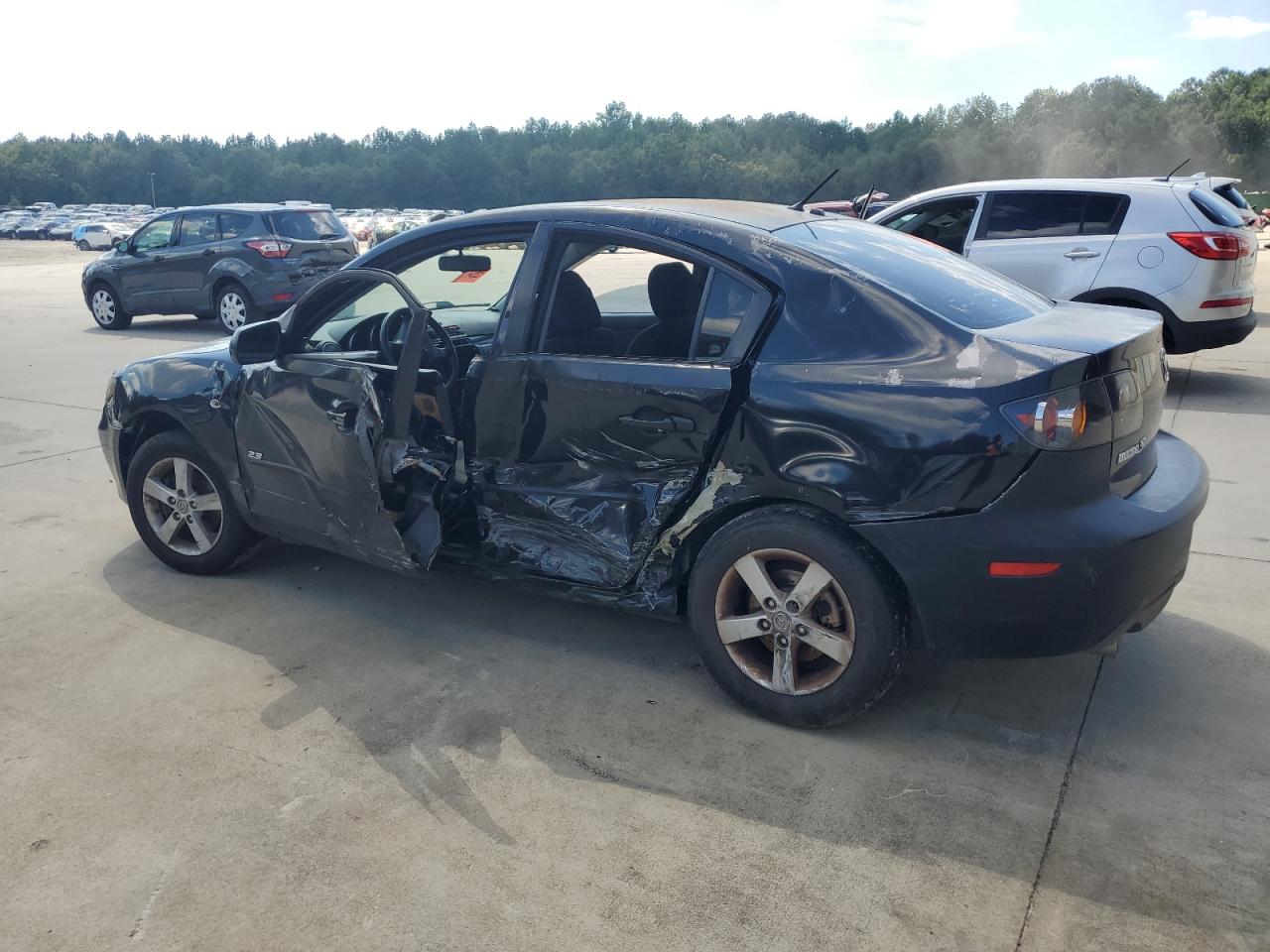 2005 Mazda 3 I black sedan gas JM1BK12F751313364 photo #3