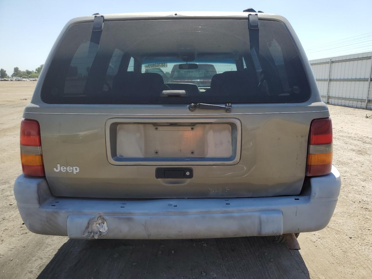 1997 Jeep Grand Cherokee Laredo VIN: 1J4FX58S0VC719225 Lot: 66762923