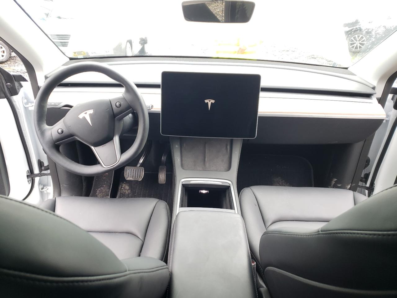 2023 Tesla Model Y VIN: 7SAYGDEE7PF606971 Lot: 66373563