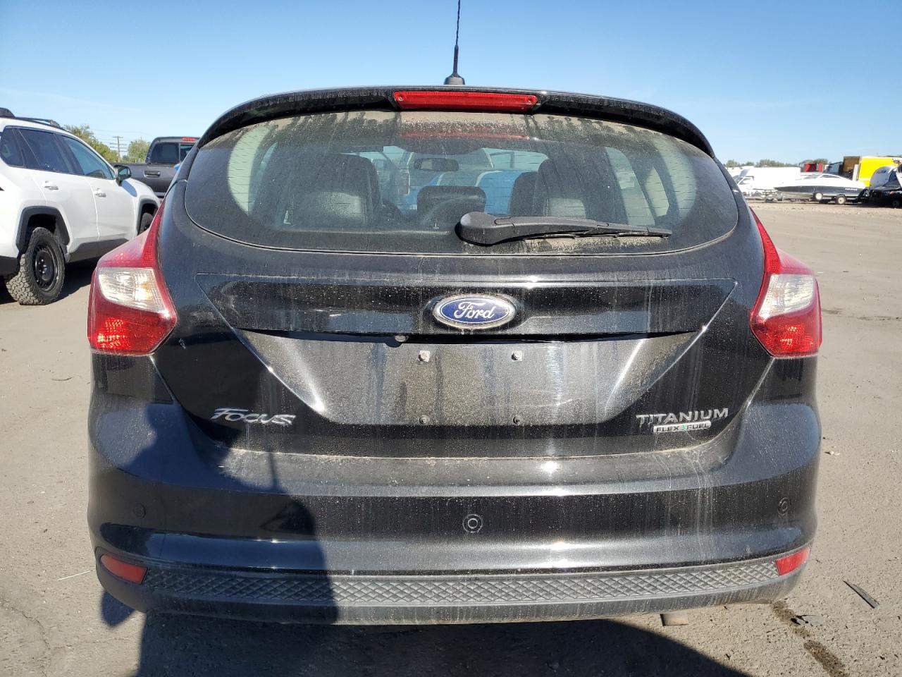 2014 Ford Focus Titanium VIN: 1FADP3N29EL328912 Lot: 72610584