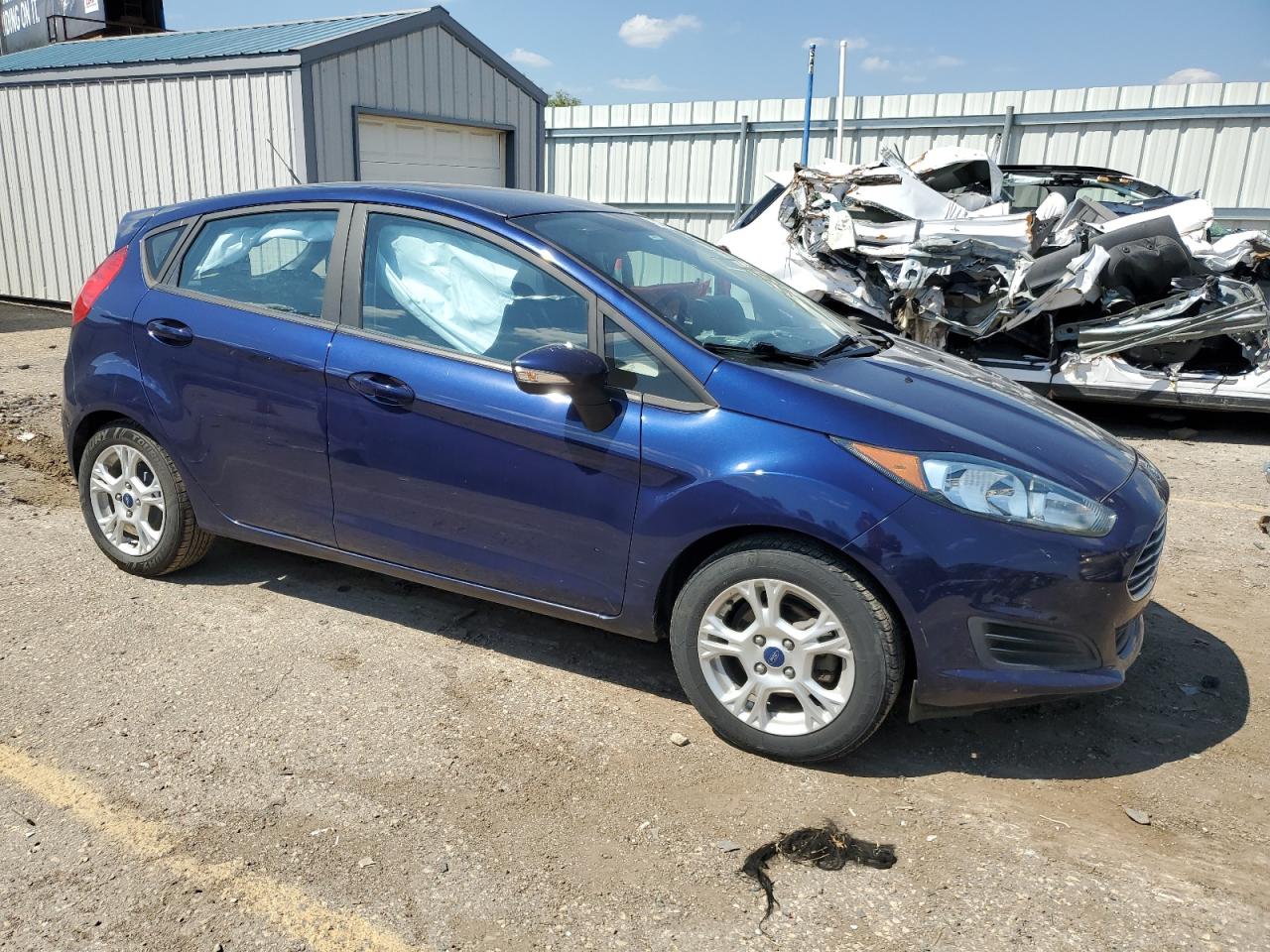 VIN 3FADP4EJ5GM112473 2016 FORD FIESTA no.4