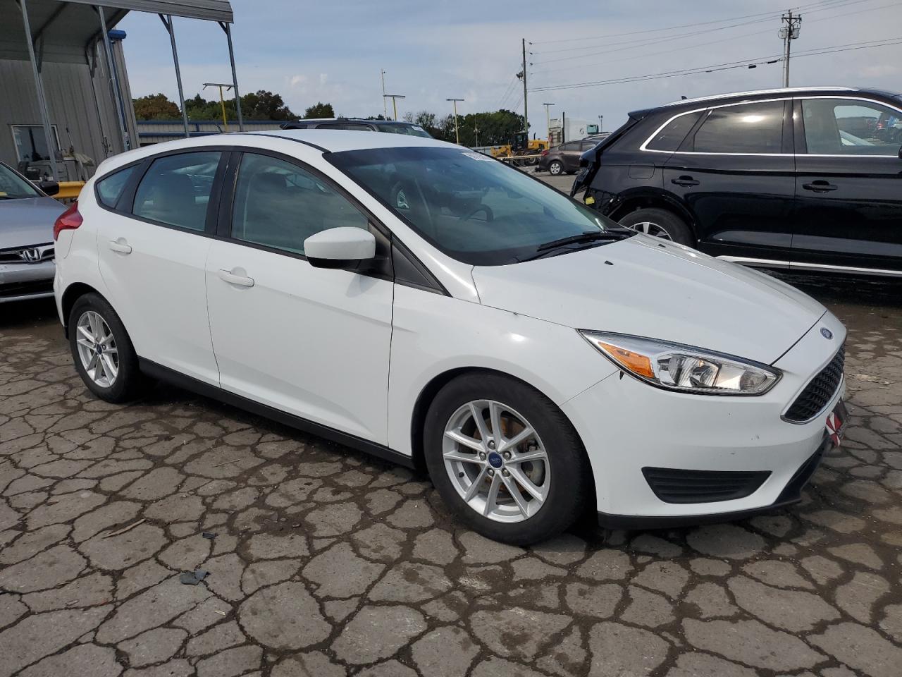 VIN 1FADP3K23JL308749 2018 FORD FOCUS no.4