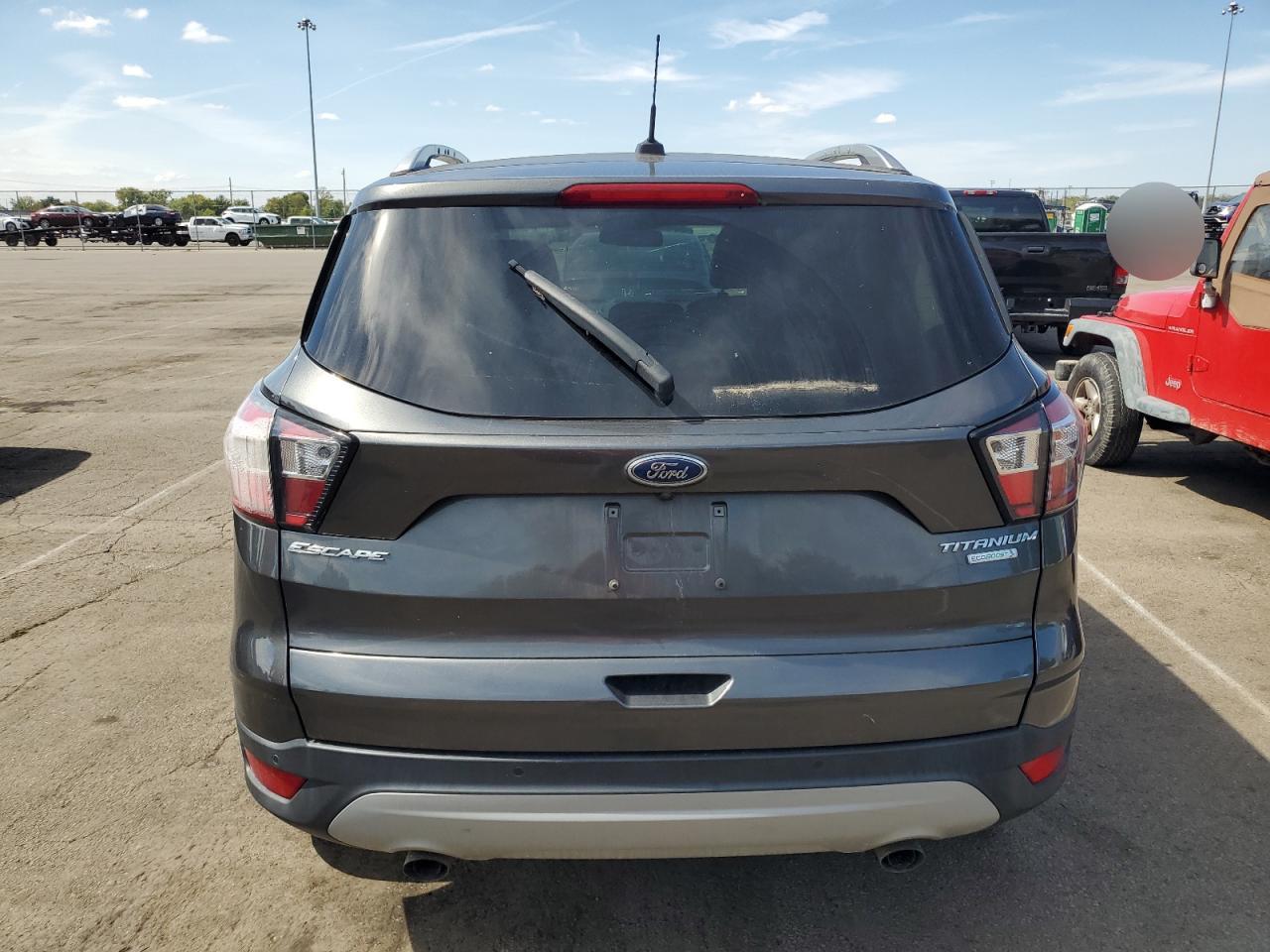 2017 Ford Escape Titanium VIN: 1FMCU0JD7HUE68438 Lot: 71234574