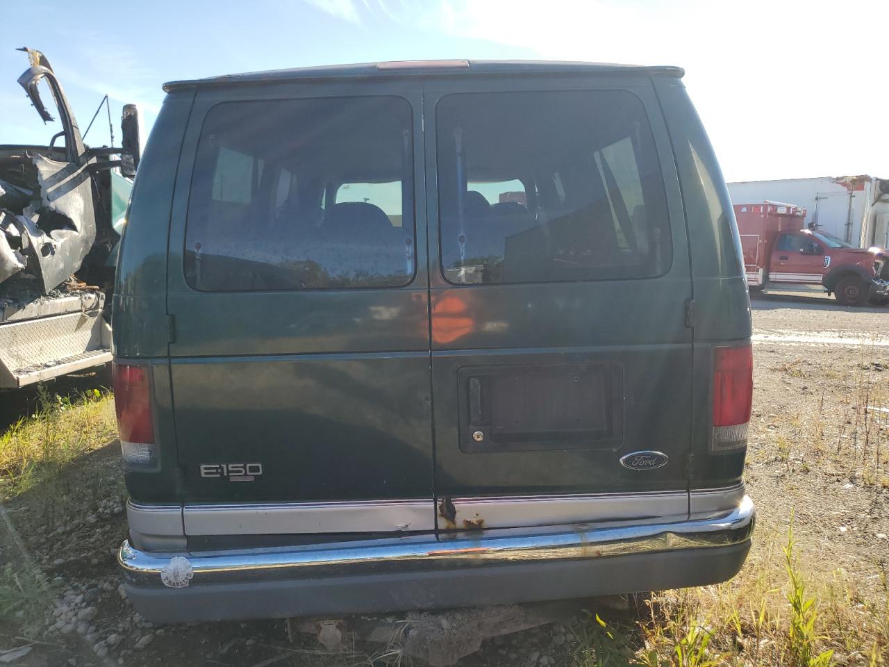 2000 Ford Econoline E150 Wagon VIN: 1FMRE11L9YHB19715 Lot: 69192734