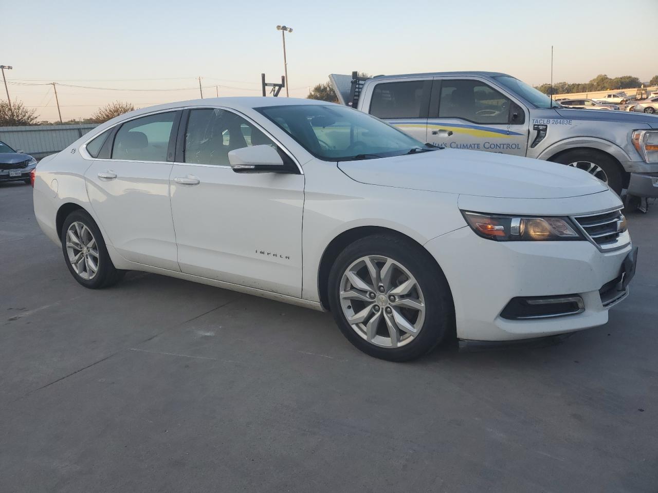 2018 Chevrolet Impala Lt VIN: 2G1105SAXJ9153573 Lot: 70662114