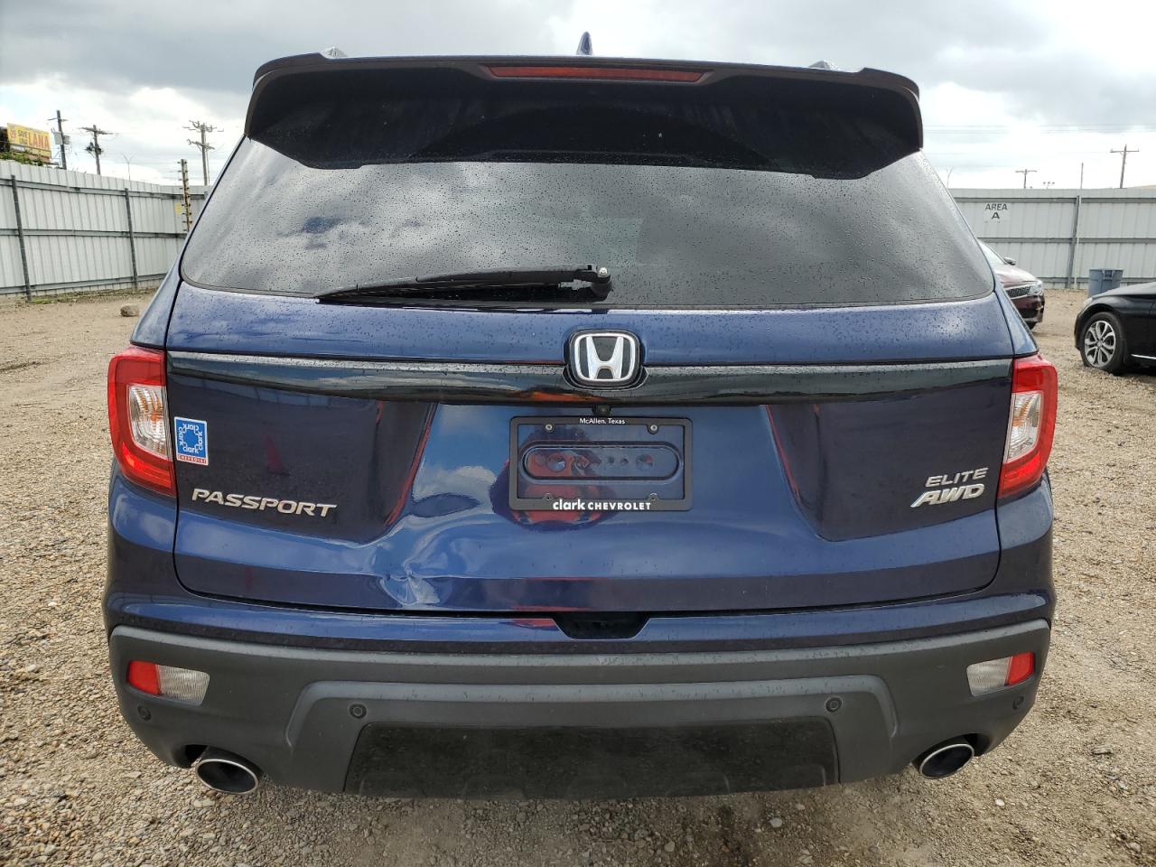 2021 Honda Passport Elite VIN: 5FNYF8H03MB004619 Lot: 72191534