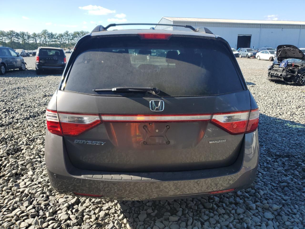 2012 Honda Odyssey Touring VIN: 5FNRL5H90CB030460 Lot: 70624414