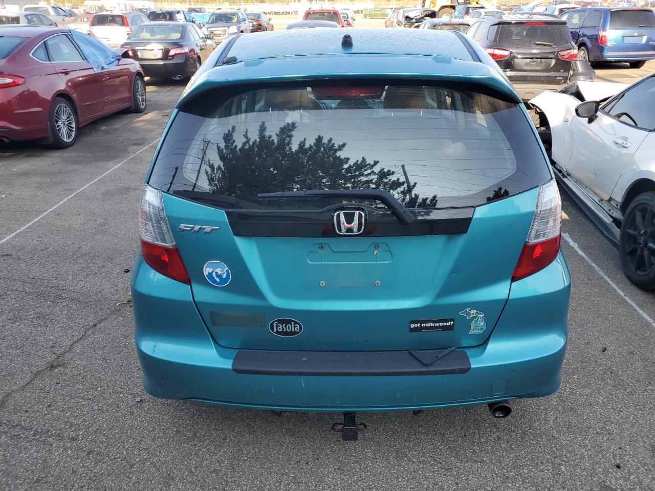 2012 Honda Fit Sport VIN: JHMGE8H52CC003448 Lot: 69140384