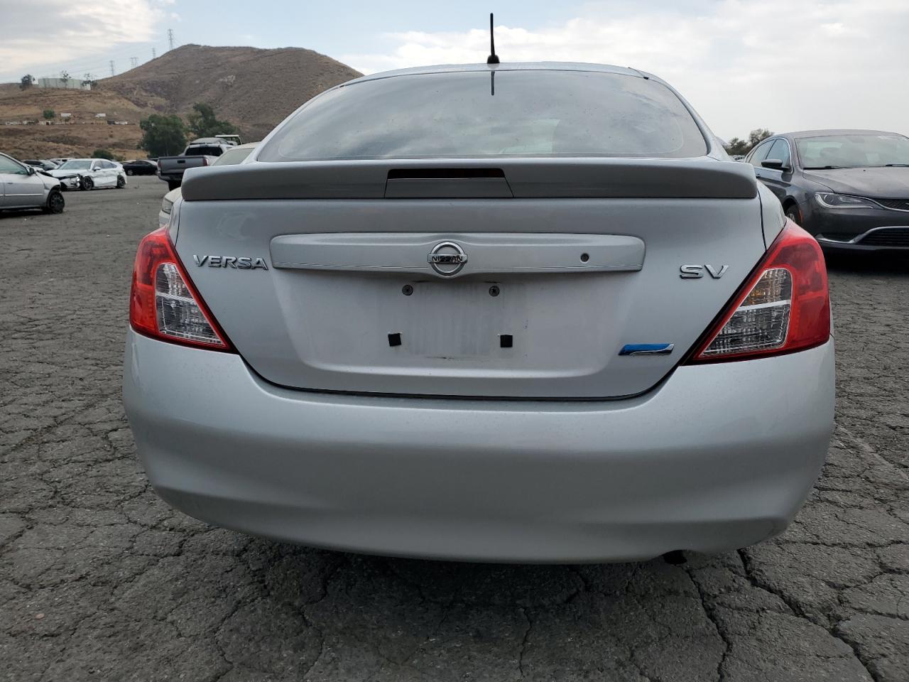 2014 Nissan Versa S VIN: 3N1CN7APXEL824524 Lot: 72615354