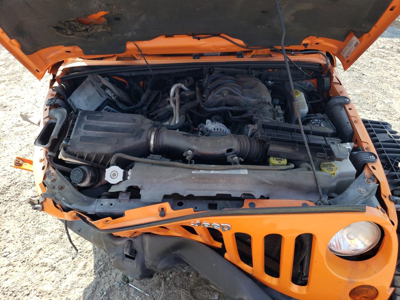 1C4GJWBG0CL160990 2012 Jeep Wrangler Sahara