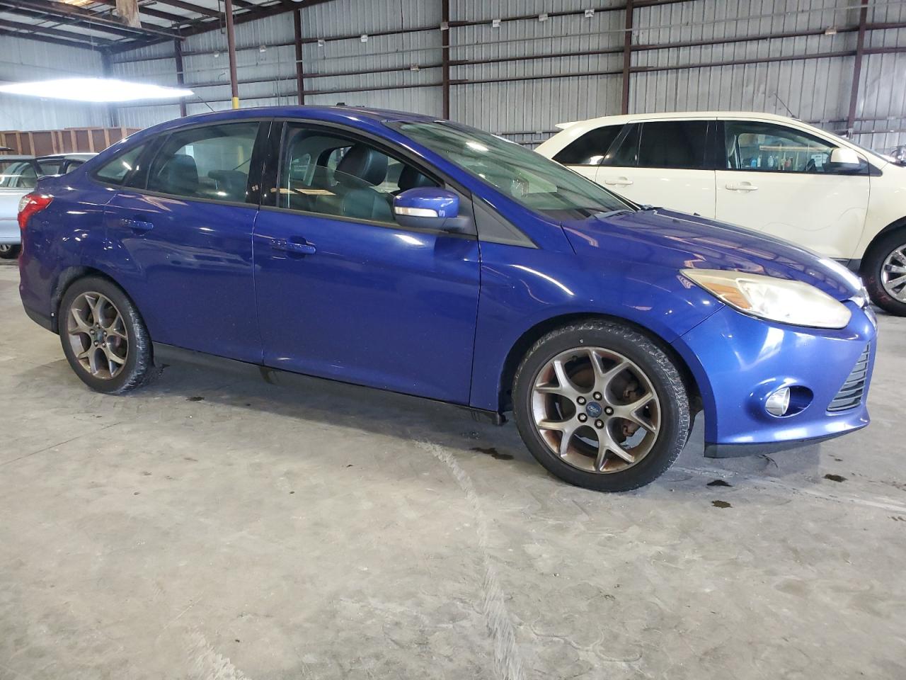 VIN 1FADP3F24DL114634 2013 FORD FOCUS no.4