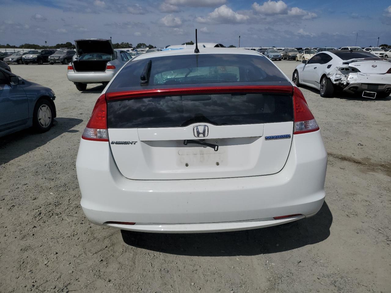 2011 Honda Insight Ex VIN: JHMZE2H77BS010455 Lot: 71838114