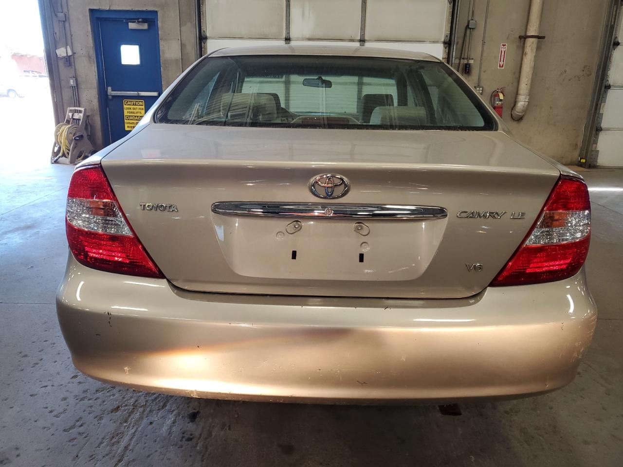 JTDBF32K130113144 2003 Toyota Camry Le