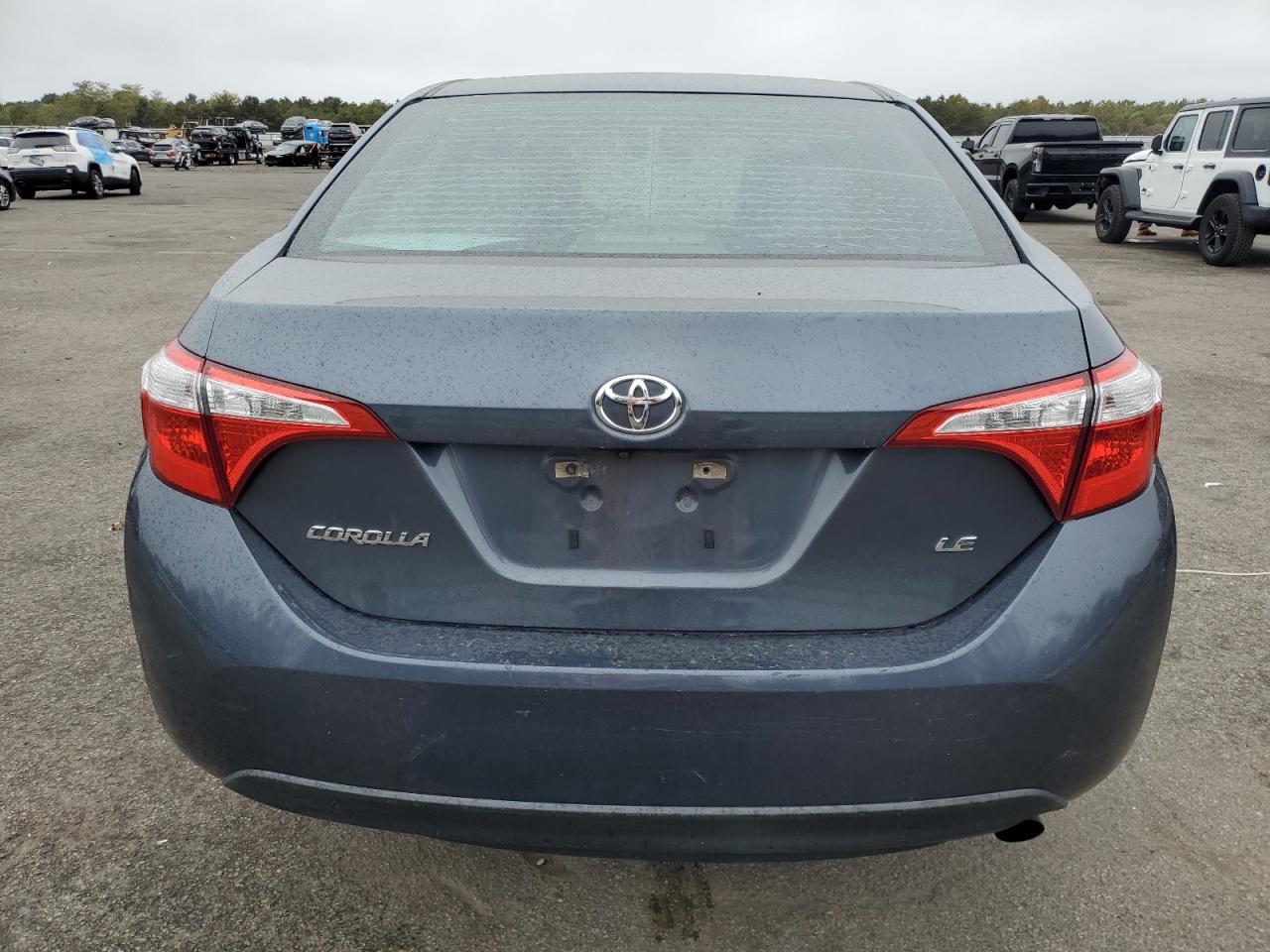 2016 Toyota Corolla L VIN: 5YFBURHEXGP405607 Lot: 72750664