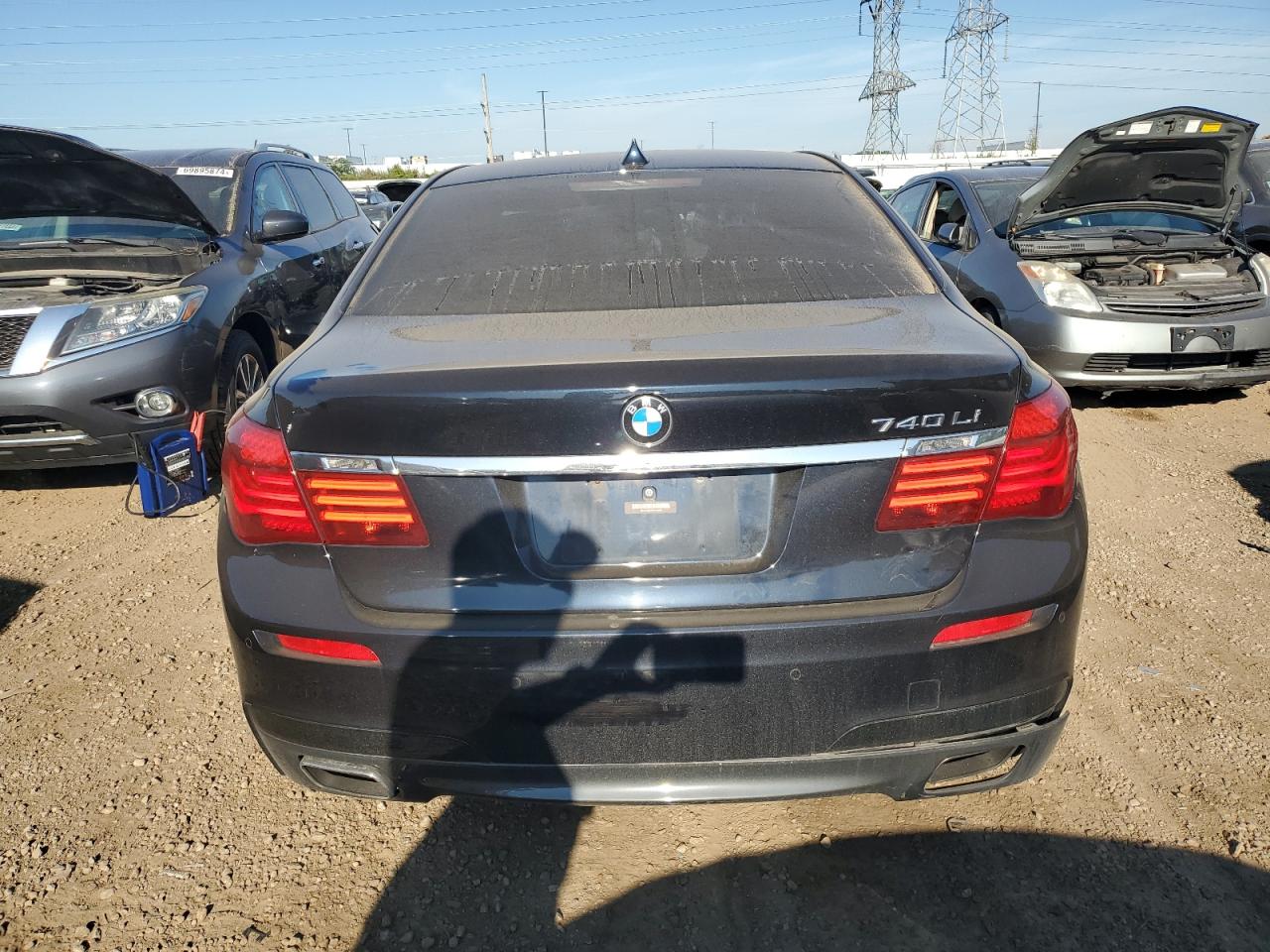 2015 BMW 740 Li VIN: WBAYE4C56FD138966 Lot: 69240874