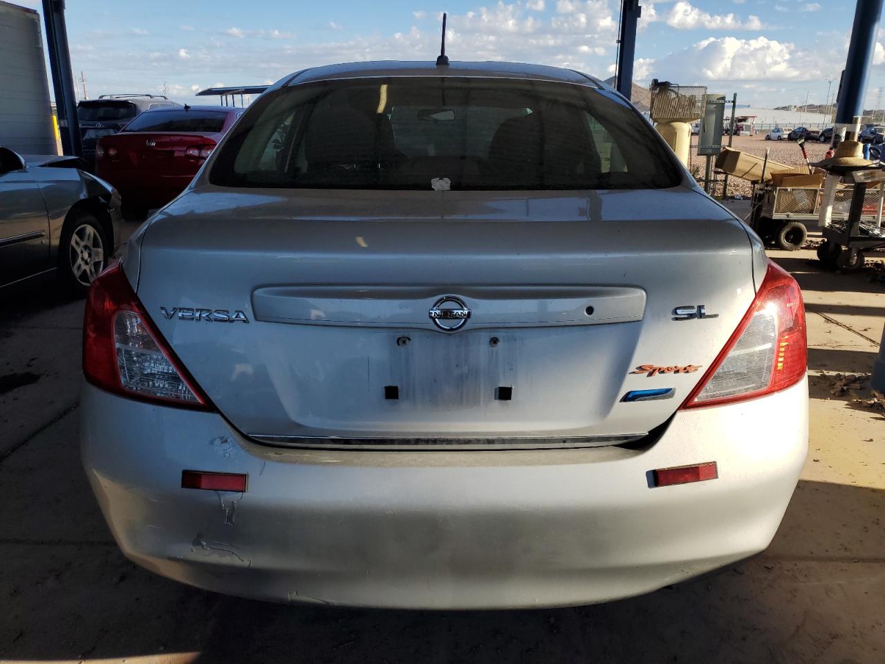 2012 Nissan Versa S VIN: 3N1CN7AP2CL933654 Lot: 72024184