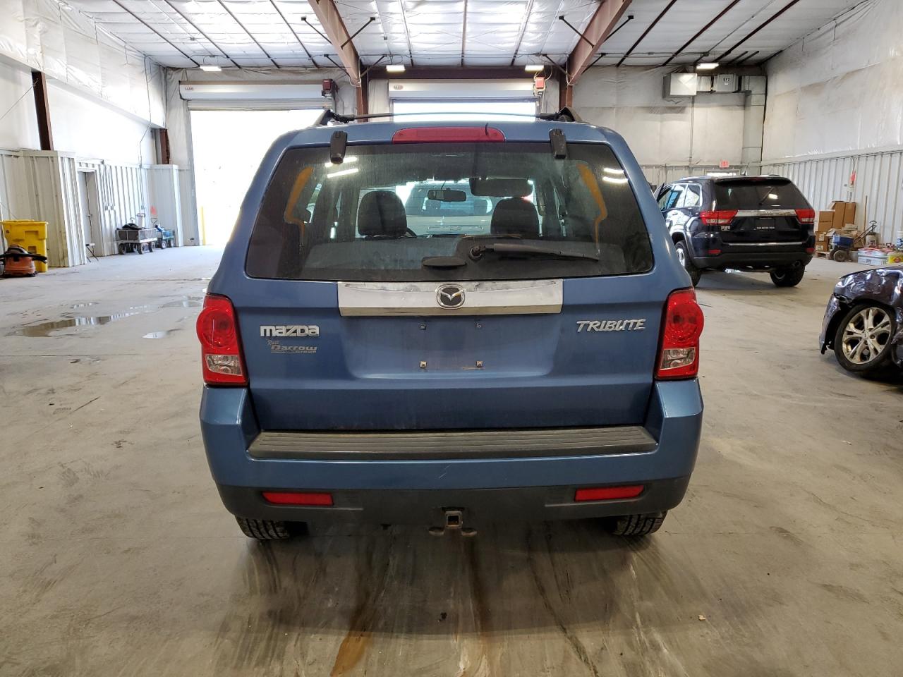 2009 Mazda Tribute I VIN: 4F2CZ02739KM04957 Lot: 71989164