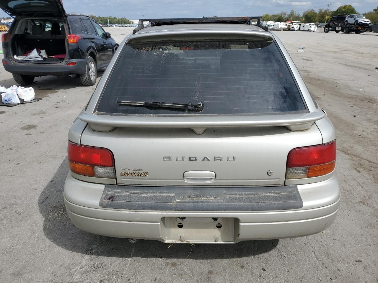 1999 Subaru Impreza L VIN: JF1GF4351XH815210 Lot: 71250504