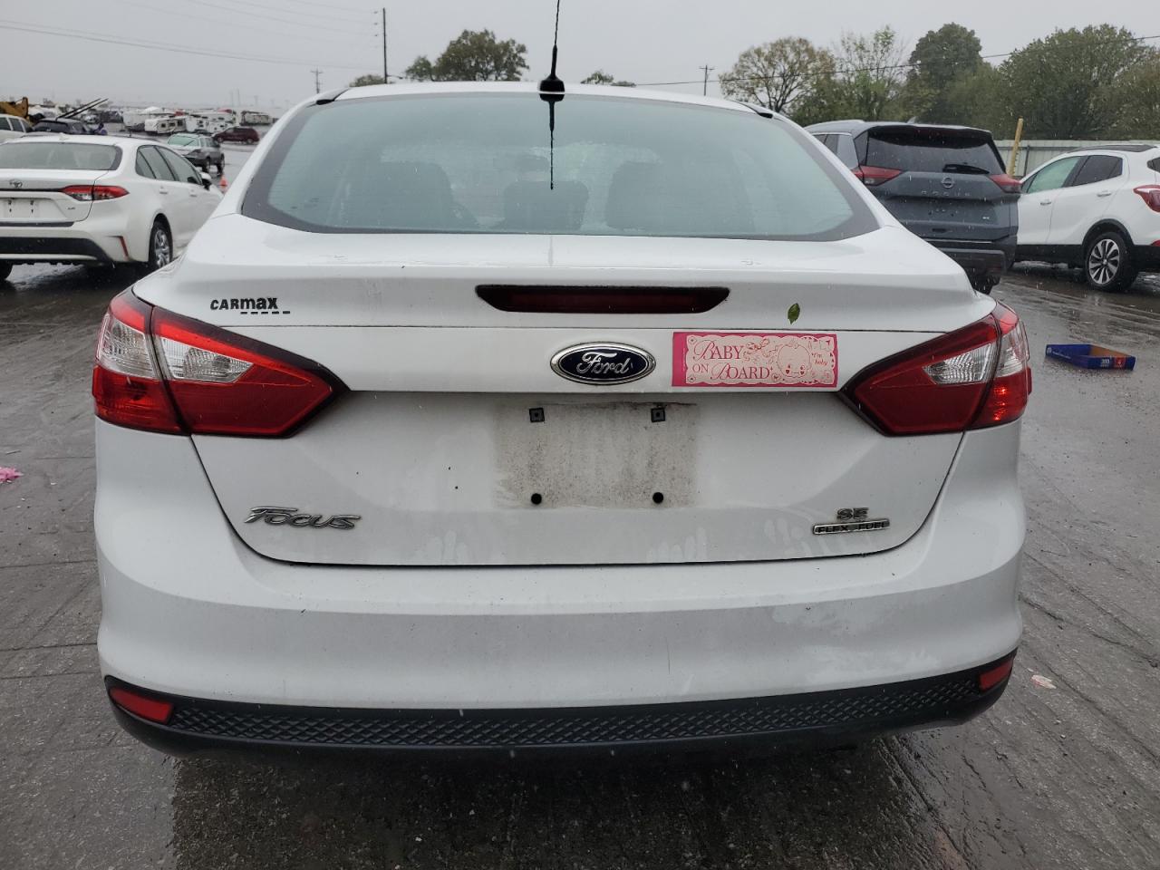 2014 Ford Focus Se VIN: 1FADP3F20EL427293 Lot: 72800044