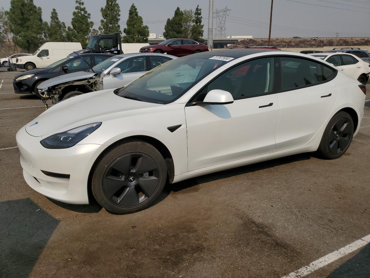 5YJ3E1EA4PF385807 2023 TESLA MODEL 3 - Image 1