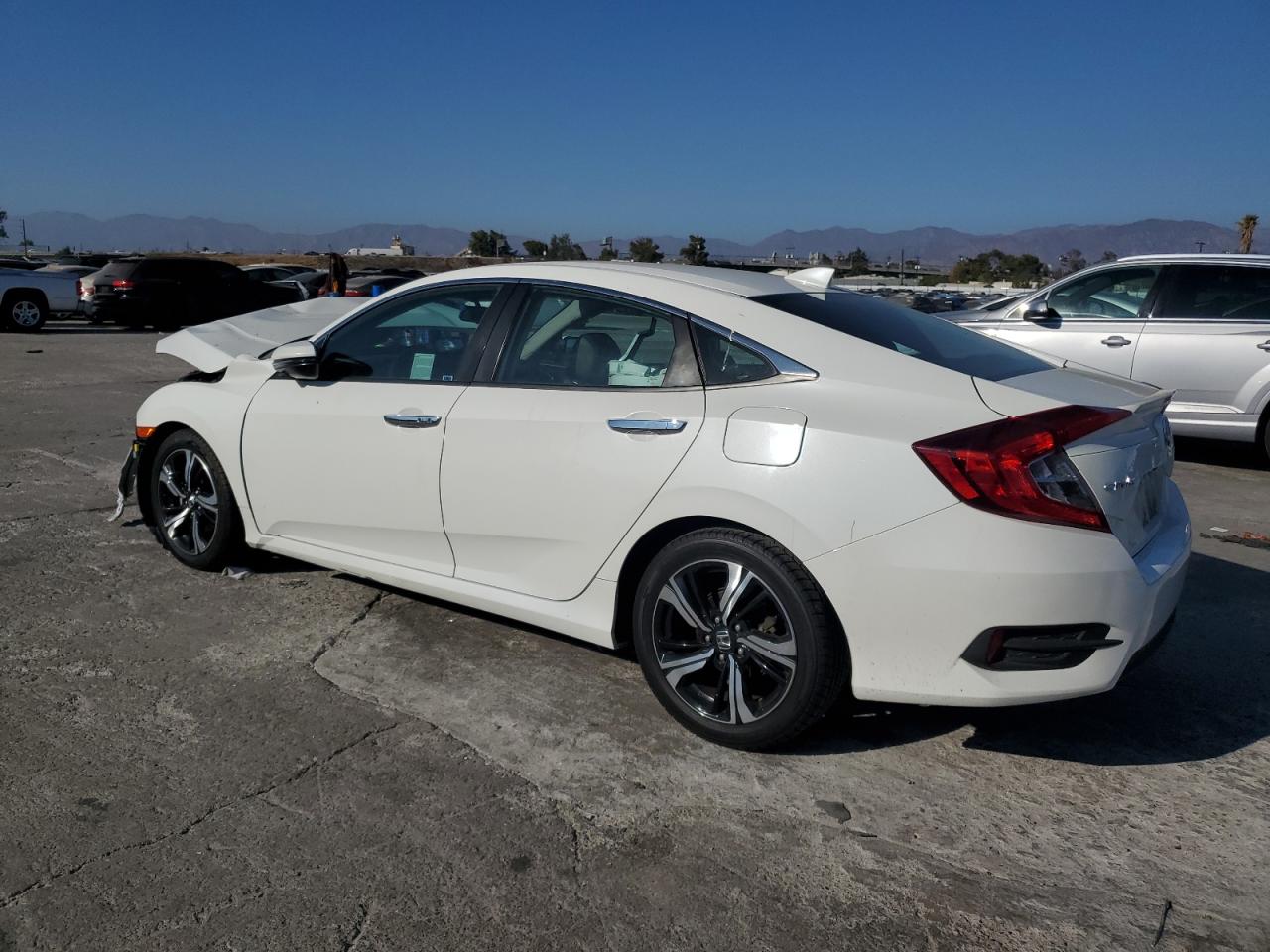 2016 Honda Civic Touring VIN: 2HGFC1F91GH647804 Lot: 73233434