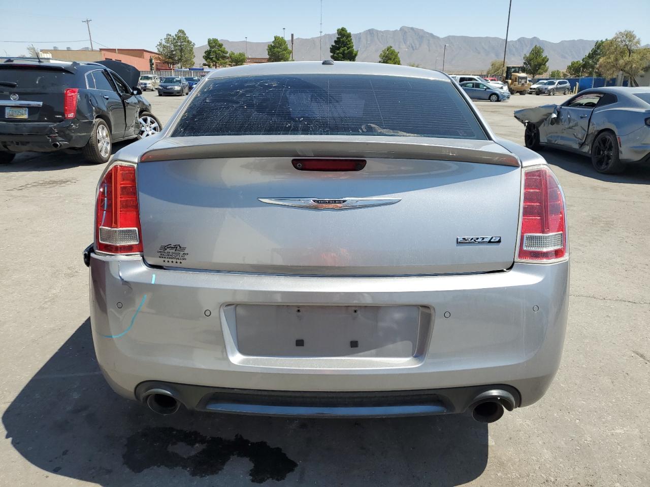 2013 Chrysler 300 Srt-8 VIN: 2C3CCAFJ8DH735423 Lot: 70628524