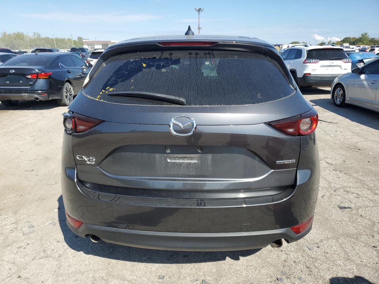 2020 Mazda Cx-5 Touring VIN: JM3KFBCM8M0449490 Lot: 73055984