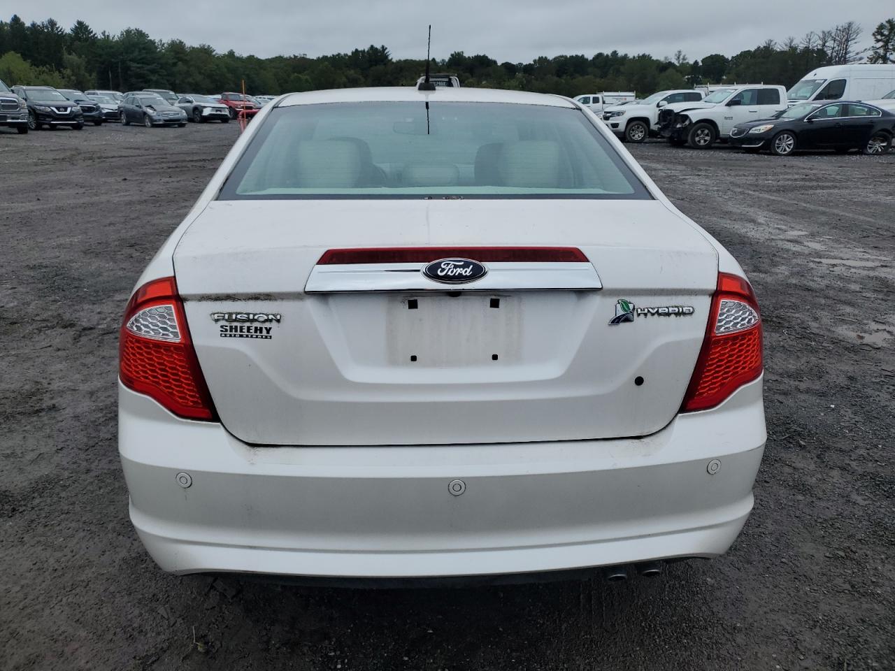 2012 Ford Fusion Hybrid VIN: 3FADP0L33CR203722 Lot: 71748594