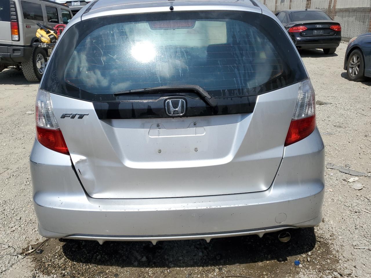 2011 Honda Fit VIN: JHMGE8H34BC010284 Lot: 71754474