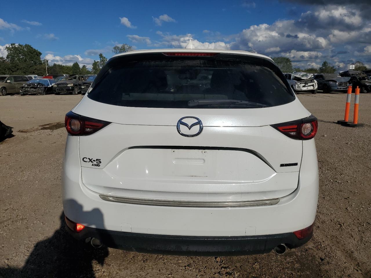 2021 Mazda Cx-5 Grand Touring VIN: JM3KFBDM9M0435239 Lot: 70053744