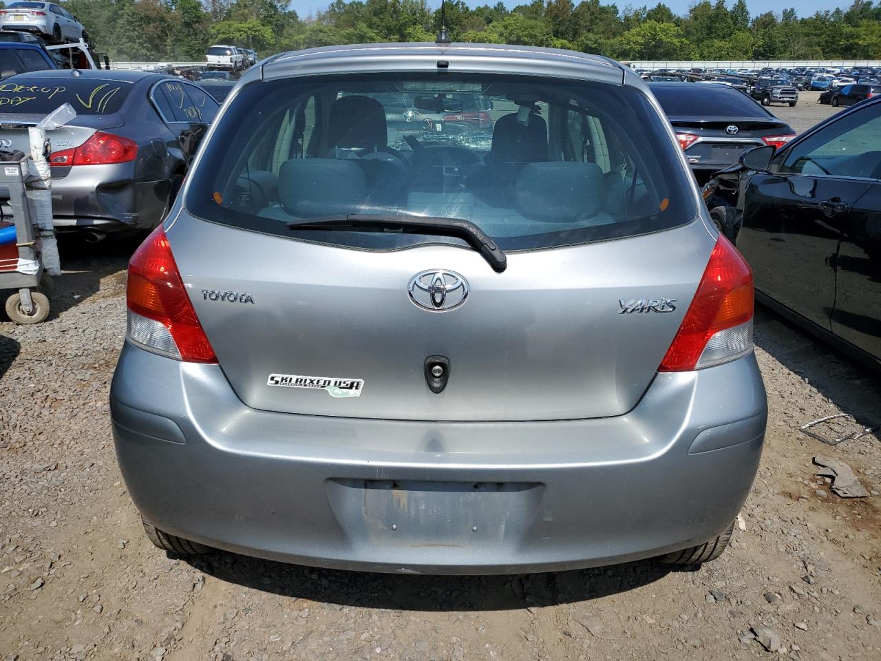 2009 Toyota Yaris VIN: JTDKT903X95255303 Lot: 70298664