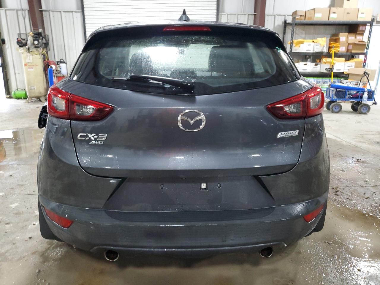 JM1DKFC70H0142559 2017 Mazda Cx-3 Touring