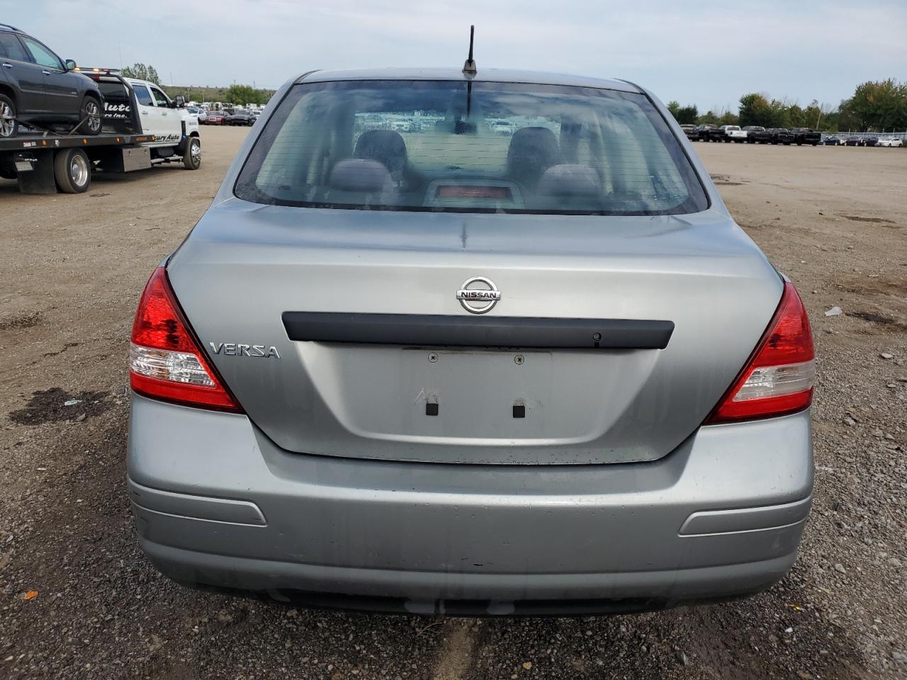 2009 Nissan Versa S VIN: 3N1CC11E49L438043 Lot: 71965944