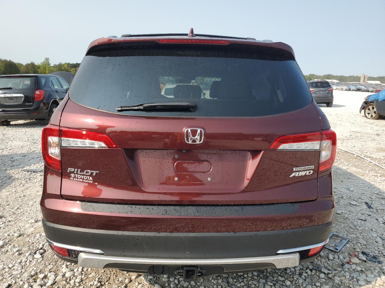 2021 Honda Pilot Touring VIN: 5FNYF6H98MB050577 Lot: 71049414