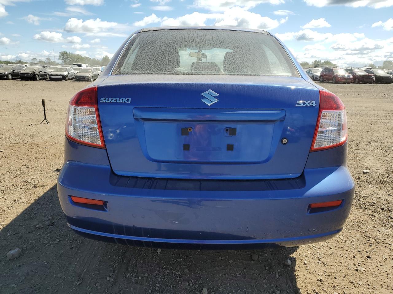 2012 Suzuki Sx4 Le VIN: JS2YC5A37C6304174 Lot: 84823544