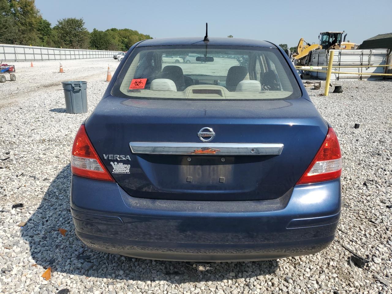 2009 Nissan Versa S VIN: 3N1BC11E79L404660 Lot: 70974824