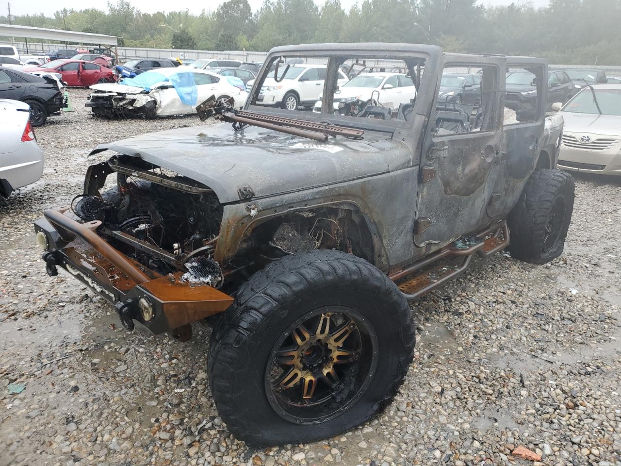 2012 Jeep Wrangler Unlimited Sahara للبيع في Memphis، TN - Burn